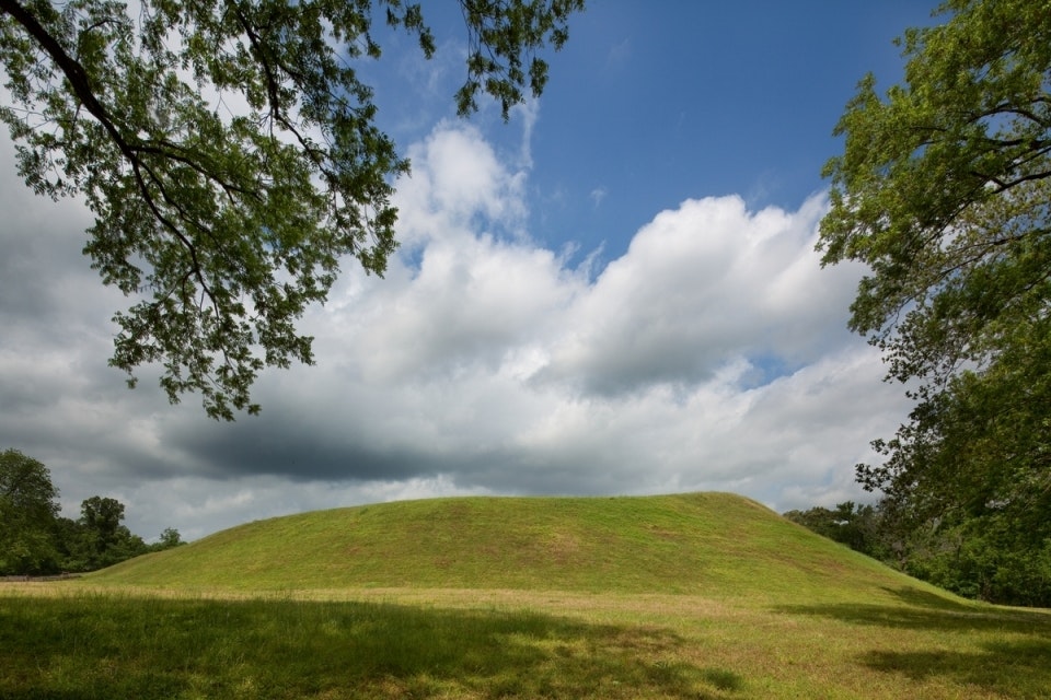 Earthen mound covered in grass