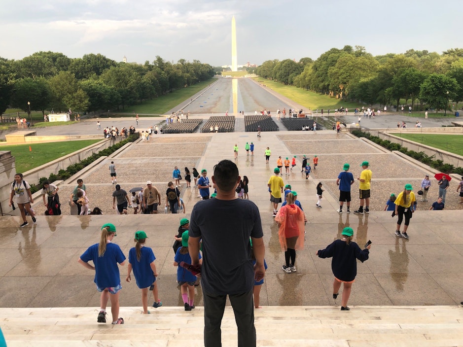 Kyle looks out onto the National Mall from the Lincoln Memorial steps