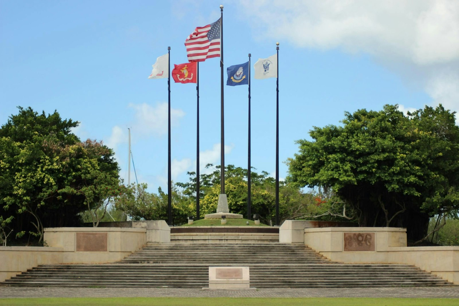 Stone steps leading up to a circle of flags known as the Court of Honor & Flag Circle.