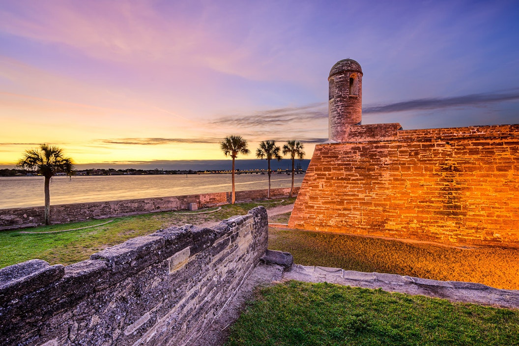 Sunset at a coastal, historic stone fort