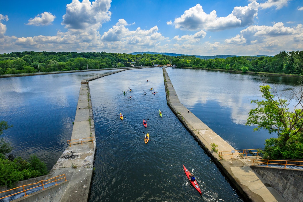 High overhead shot of paddlers in a canal on a sunny summer day