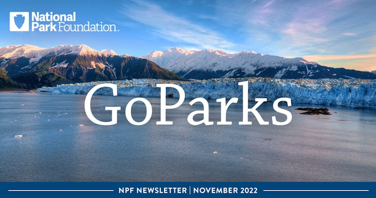 An icy lake stretches towards snow-capped mountains. The text reads "GoParks; NPF Newsletter: November 2022"