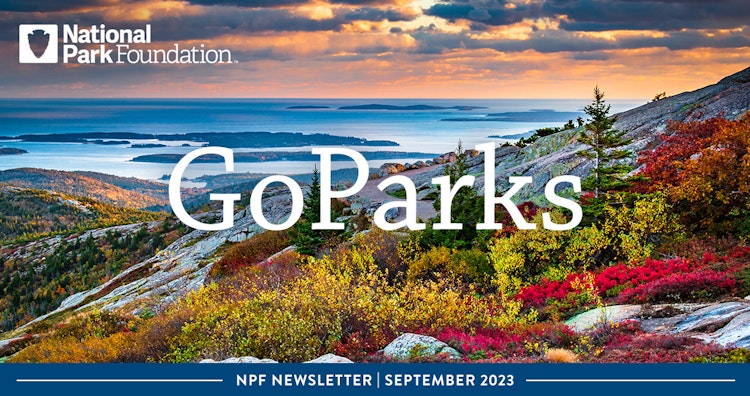 Autumn-colored landscape leading to a big body of water. On the image, text reads "National Park Foundation; GoParks; NPF Newsletter | September 2023"