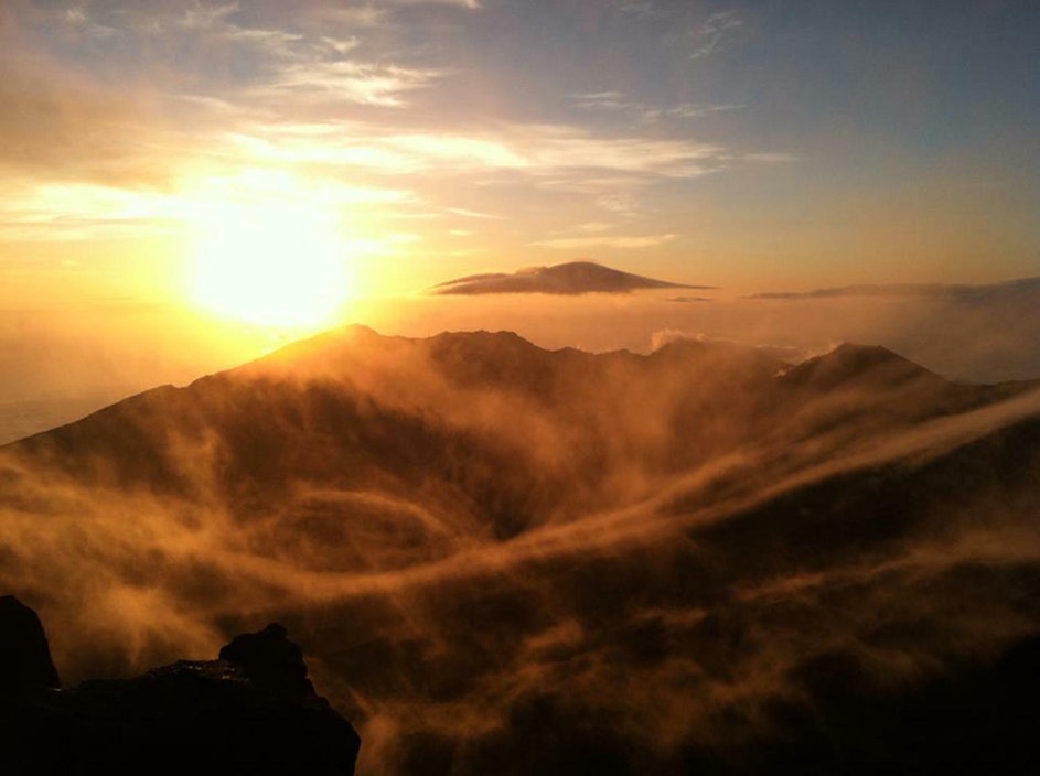 A view of Haleakalā crater and sunrise