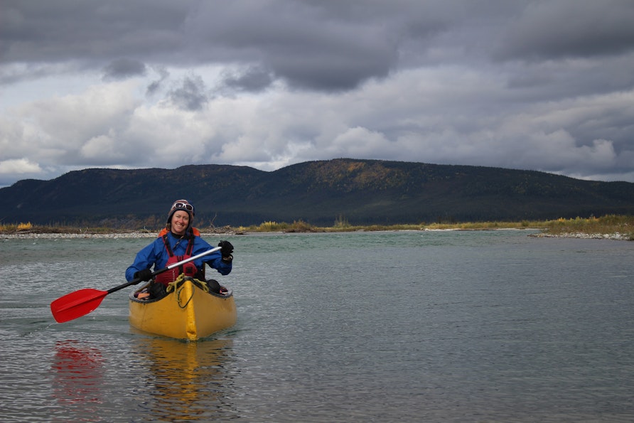 Hannah Malvin paddles on a lake