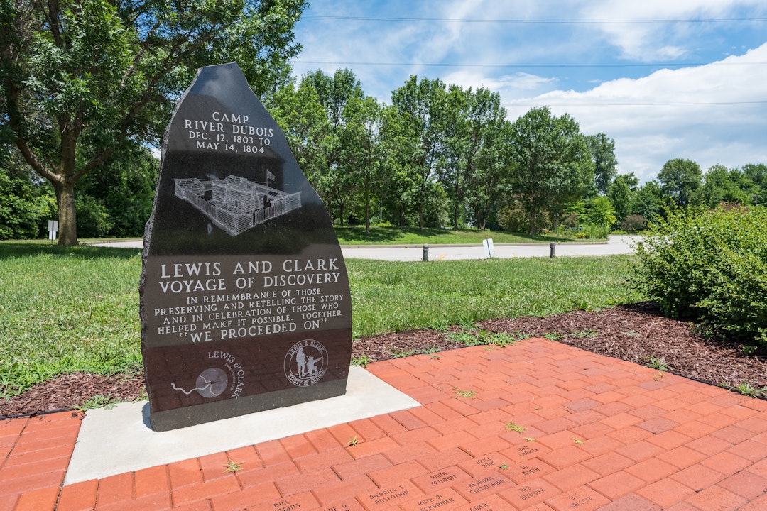 Stone marker over 6 feet tall with a drawing of a fort reads: Camp River Dubois. December 12, 1803 to May 14, 1804. Lewis and Clark Voyage of Discovery. In rememberance of those preserving and retelling the story and in celebration of those who helped make it possible. Together "we proceeded on"
