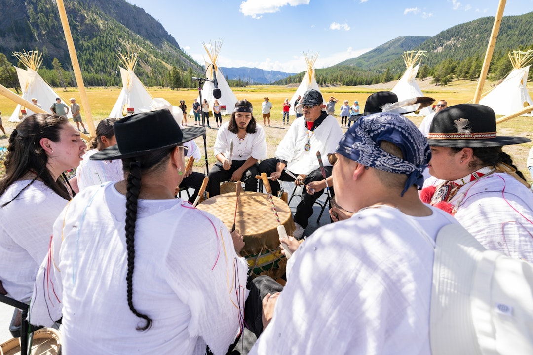 A circle of Indigenous drummers