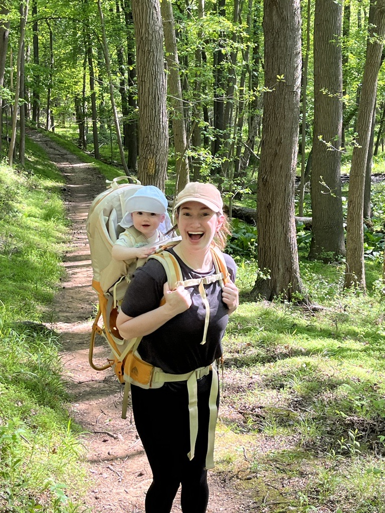 Sarah Slavin with her daughter on her back