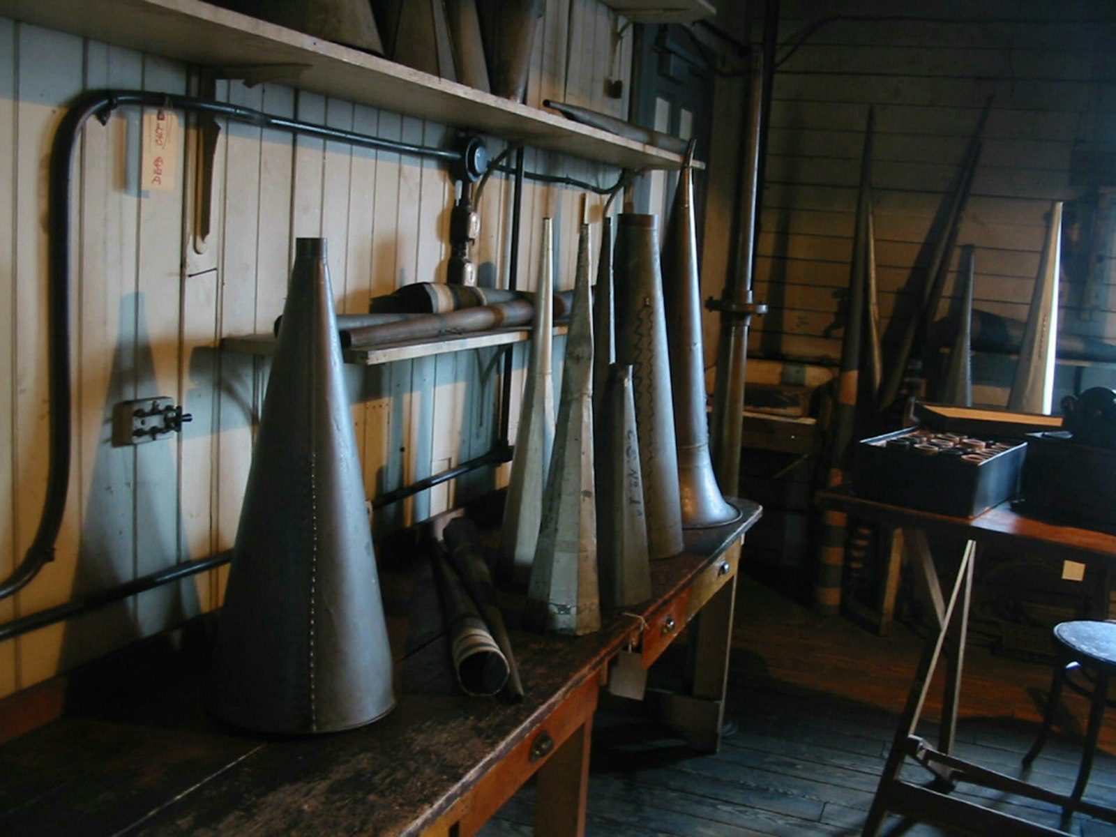 In a workshop, a collection of ear horns
