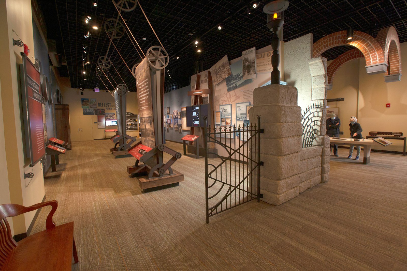 Various exhibits inside a historic red brick building