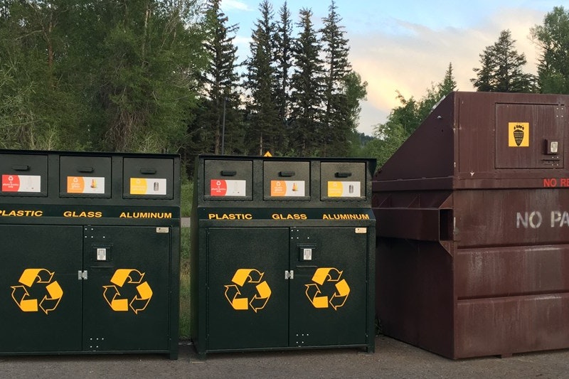 Recycling bins lined up next to each other