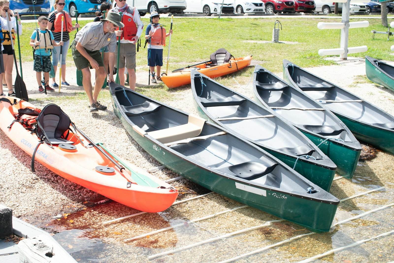 Canoes lined up on a beach