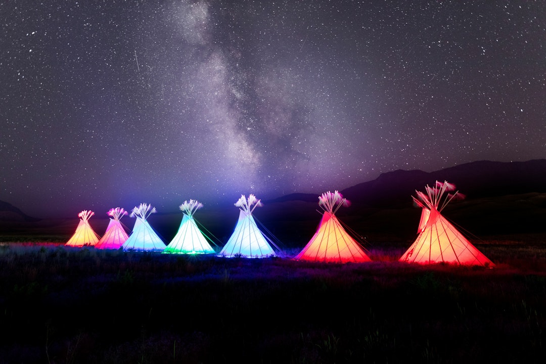 Illuminated teepees at Yellowstone