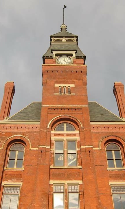 Facade of a red brick clocktower